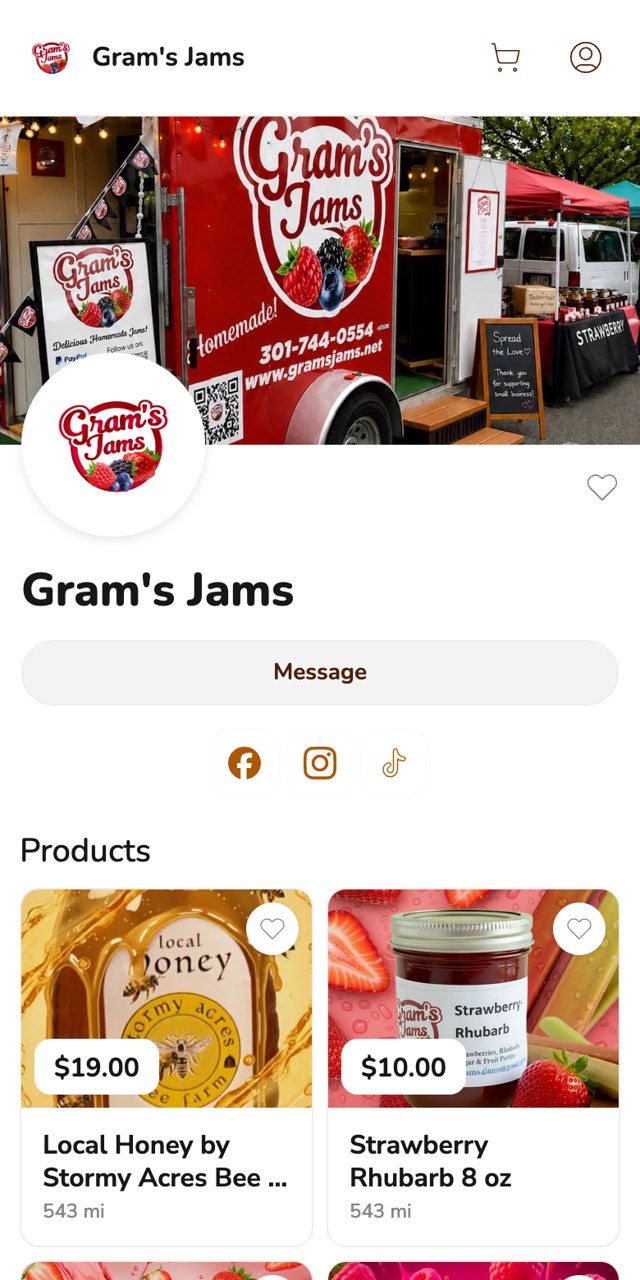 Phone screenshot of the Gram's Jams storefront on Homegrown, showing a banner photo of a red trailer with the Gram's Jams logo, the round logo, a Message button and two products, local honey and an 8 oz strawberry rhubarb jam in a jar with a white label